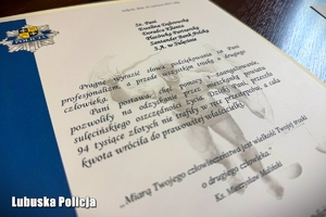 Podziękowania zapisane na ozdobnej kartce